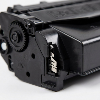 Macro studio photograph showcasing the precision-engineered plastic gears, side panels, and intricate texture details of the Elevate Imaging Compatible HP CE505X toner cartridge, emphasizing its build quality.