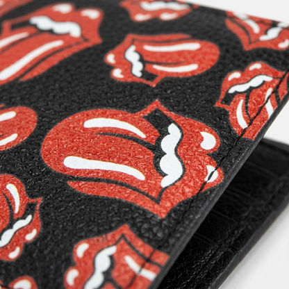 Extreme macro view of the textured leather and a Rolling Stones lip logo.