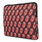 A pristine high-resolution hero shot of The Rolling Stones Core Laptop Sleeve 15.6" against a pure white background. The front shows an all-over repeating pattern of the iconic red tongue and lips logo on a sleek black polyester fabric. A black zipper outlines the top edge, and the subtle "The Rolling Stones" label is visible on the side for brand authenticity. Shot at eye level with neutral, even lighting.