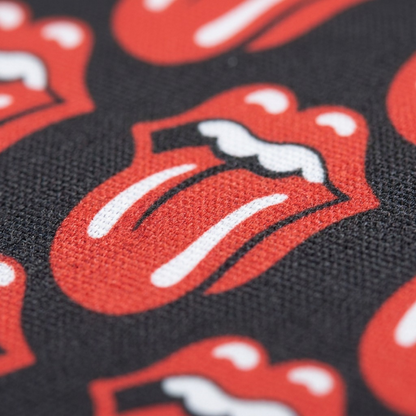Close-up detail of the woven polyester fabric on The Rolling Stones laptop sleeve.