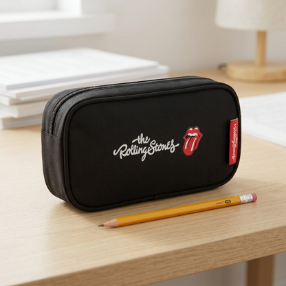 A photo-realistic image showcasing the Bugatti Rolling Stones pencil case next to a standard graphite pencil, illustrating its actual size and compact design.