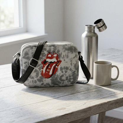 Scale reference photo: The Rolling Stones tie-dye bag next to a smartphone.