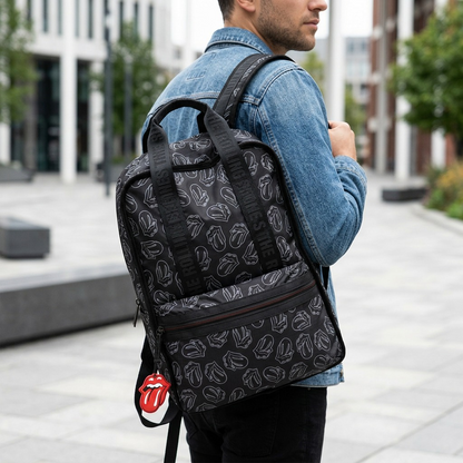 A photo of The Rolling Stones Evolution backpack being carried on a person's shoulder during a day out.