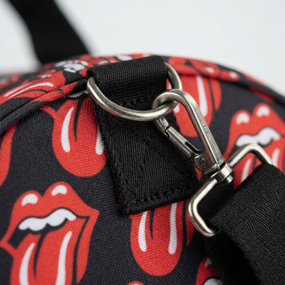 Macro detail of the Rolling Stones duffle bag hinge and logo pattern.