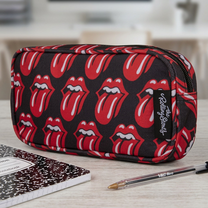 Scale reference for Bugatti Rolling Stones pencil case: 16:9 view beside a standard composition notebook on a desk.