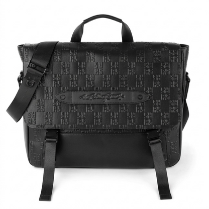 A high-resolution, centered view of the black Bugatti The Rolling Stones leather messenger bag on a white background. It features a unique all-over RS monogram pattern and buckle closures.