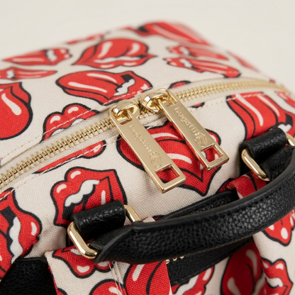 A detailed close-up of the Bugatti Rolling Stones backpack shows the textured fabric and gold-tone zippers.