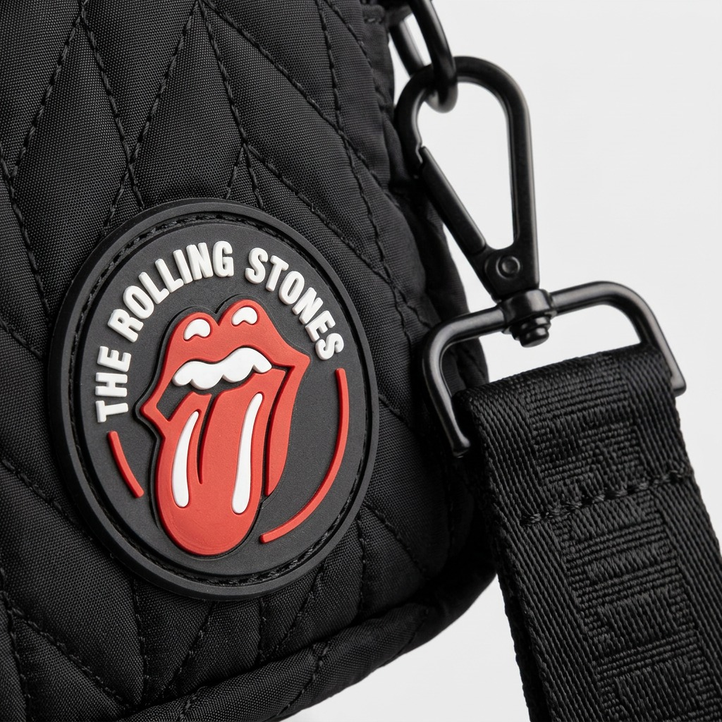 Macro detail shot focusing on the Rolling Stones patch and robust hardware connector.