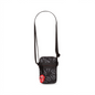 A high-resolution product shot of the black Bugatti x Rolling Stones mobile case against a pure white background. The small crossbody bag, made of grey-on-black logo-patterned ripstop polyester, features a prominent red tongue logo charm attached to the zipper pull. Full black shoulder strap included.