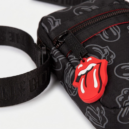 Macro detail of ripstop fabric and Rolling Stones logo charm.