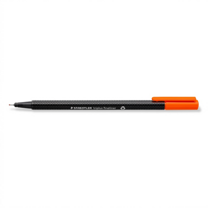 A sharp, high-resolution product photograph of the STAEDTLER triplus fineliner pen (MPN 334-4-A7), featuring a black textured barrel and bright orange cap, centered on a pure white background with realistic lighting and clean shadow.