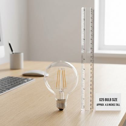 Sylvania SMART+ WiFi G25 filament LED bulb shown to scale with a ruler on a desk, approximately 4.5 inches tall.