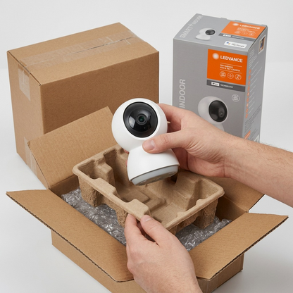 Unboxing a LEDVANCE SMART+ WiFi Indoor camera from its custom-molded protective insert.
