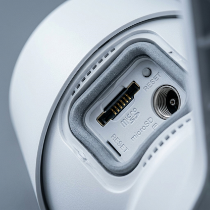 Macro detail shot of the LEDVANCE camera showing weather-sealed SD slot, reset, and power port.