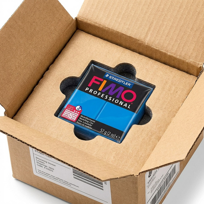 An open, protective shipping carton reveals the STAEDTLER Fimo True Blue clay block nested in foam, demonstrating safe, damage-free delivery.
