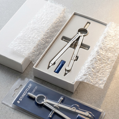 STAEDTLER 551-WP00A602 in custom-molded protective insert, bubble wrap, and shipper box for secure delivery.