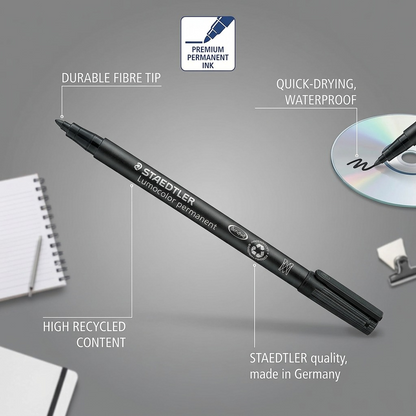 An ecommerce product infograph showing the Staedtler 317-9 Lumocolor permanent marker with feature callouts for durable fibre tip, quick-drying waterproof ink, high recycled content, and made in Germany quality.