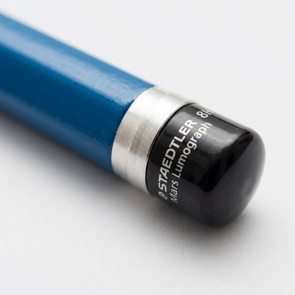 ~ A detailed macro shot showing the '8H' grade stamp and 'MADE IN GERMANY' text on the pencil's end.