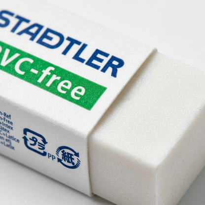 Macro view focusing on the fine print quality of the STAEDTLER logo and the matte texture of the eraser material.