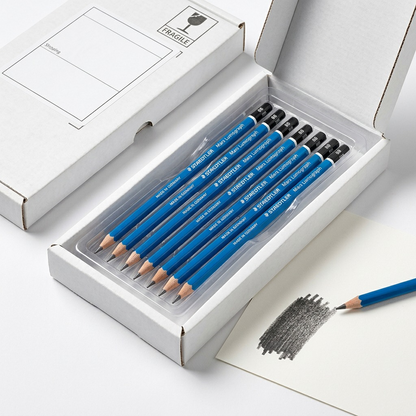 STAEDTLER Mars Lumograph 8B pencils are unboxed from protective white cardboard.