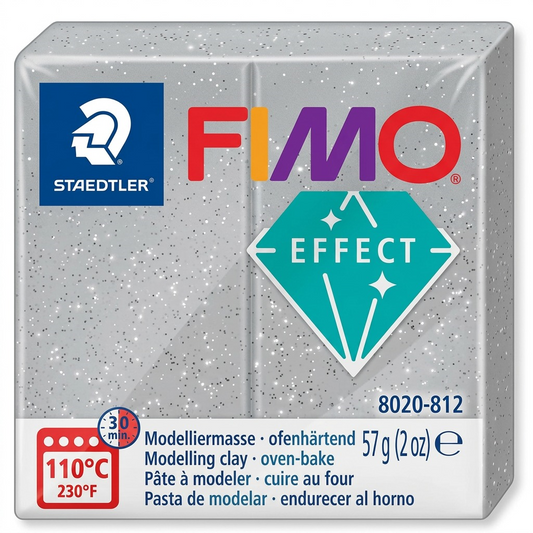 A high-resolution, centered view of a 57g (2 oz) block of grey glitter FIMO Effect oven-bake modelling clay (STAEDTLER, item 8020-812) on a white background, featuring realistic texture and markings.