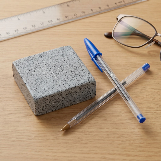 Fimo Effect Stone Granite block beside a pen, illustrating its size.