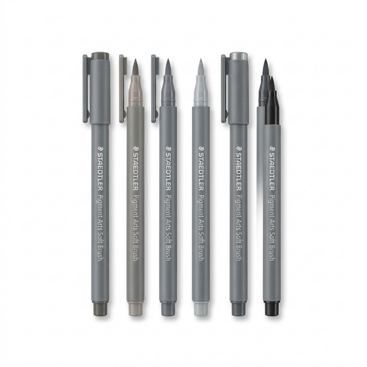 A pure high-resolution hero shot showing six grey and black STAEDTLER Pigment Arts Soft Brush markers.