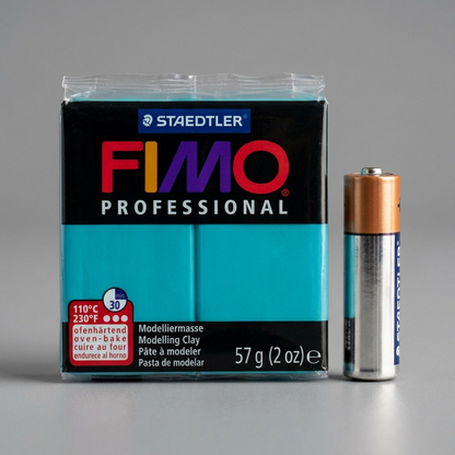 The STAEDTLER FIMO Professional 57g modelling clay block shown with an everyday AA battery for size reference.