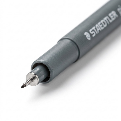 Extreme close-up of the metal-clad STAEDTLER pigment liner 0.1mm tip and nozzle.