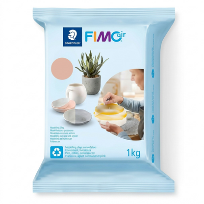 High-resolution hero product shot of STAEDTLER Fimoair 8101-43 1kg Pale Pink modeling clay on a seamless white background.
