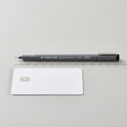 An image comparing the size of a STAEDTLER Fineliner 308-05-9M (0.5mm, black) with a standard credit card.