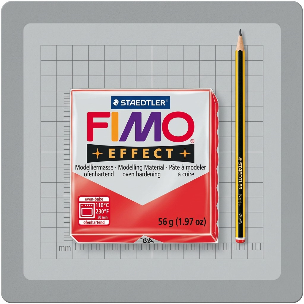 A photo of a STAEDTLER Fimo Effect Red block with a standard pencil next to it for scale.
