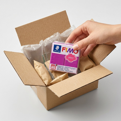 Unboxing confidence for Fimo Soft Purpure 57g, showing internal padding.