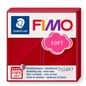 A high-resolution, centered photograph of a block of Cherry Red STAEDTLER Fimo Soft modeling clay.