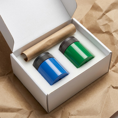 A premium unboxing display showing the Staedtler 511 sharpeners protected in high-quality shipping materials.