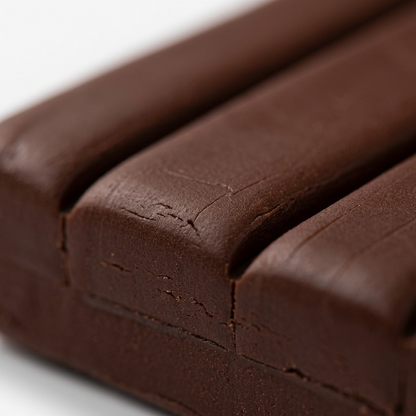 Macro photo with shallow depth of field of the chocolate Fimo Soft's segmented blocks and surface.