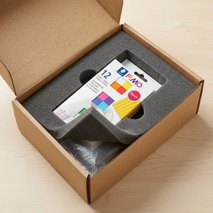 A PDP visual matrix image showing the STAEDTLER Fimo set in protective shipping materials, reducing unboxing anxiety.