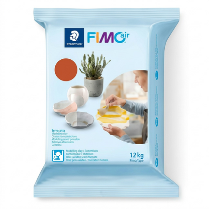 A high-resolution, centered image of a 1kg Terracotta block of STAEDTLER Fimoair Modelling Clay (MPN 8101-76) in its original bag, showcasing all brand markings, for an elegant e-commerce hero shot.