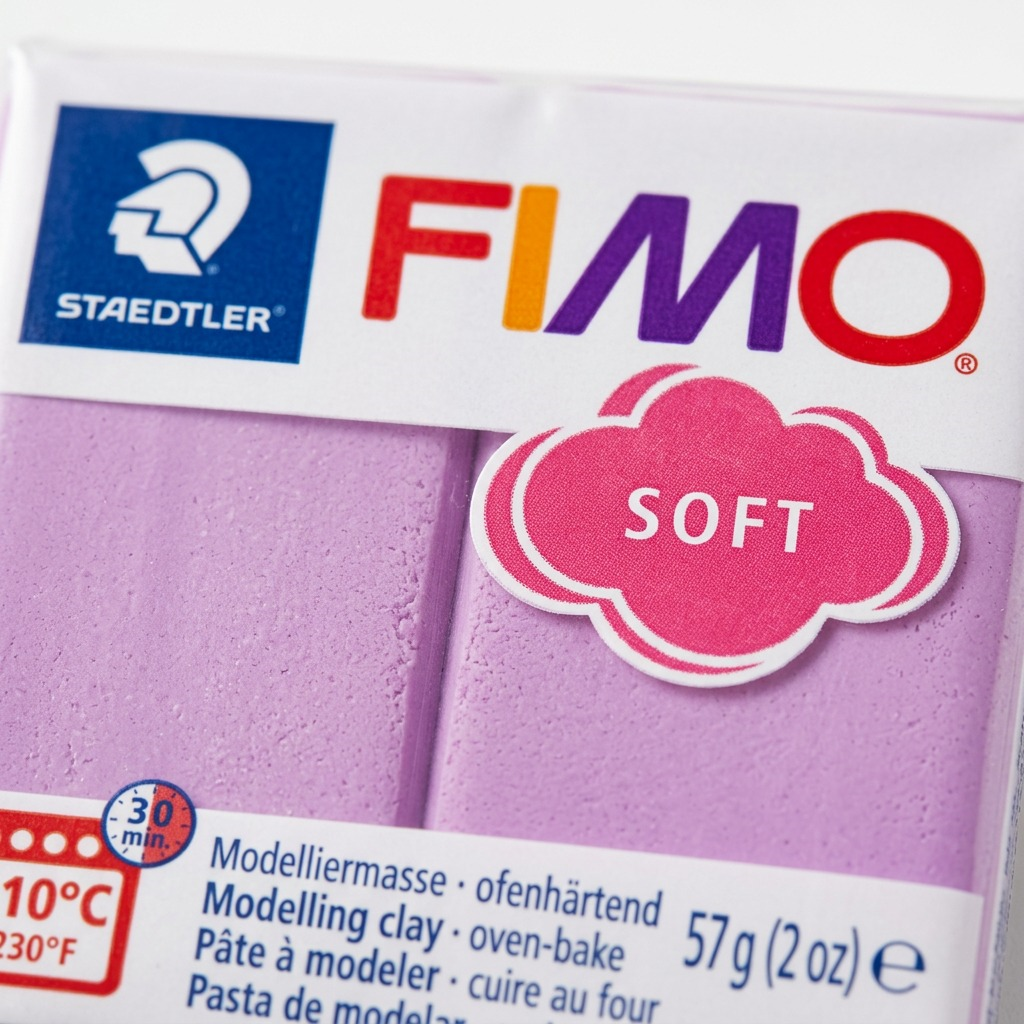 FIMO Soft lavender clay, extreme close-up of matte and textured surfaces with crisp STAEDTLER logo.