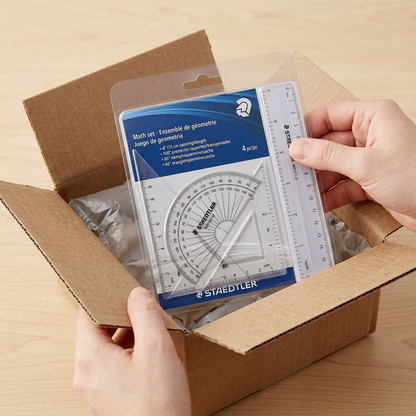 A high-resolution product shot shows a STAEDTLER set (MPN: 569-WP4-02) within its protective bubble bag for shipping.
