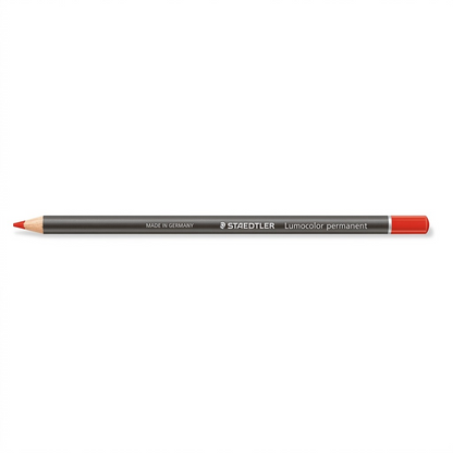 Pure hero shot of a red Staedtler Lumocolor permanent glasochrom dry marker pencil on a white background.
