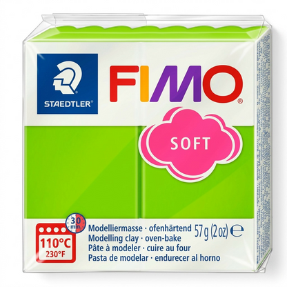High-resolution hero shot of STAEDTLER Fimo Soft modelling clay, apple green, in clear packaging on a white background.