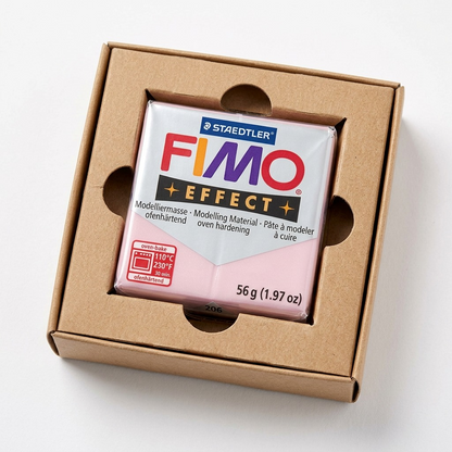 Closer view of a FIMO Effect block in pristine condition, resting securely inside a fitted cardboard insert.
