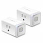 A detailed high-resolution product photograph of two TP-Link Kasa Smart Wi-Fi Plug Lite HS103 smart plugs, floating side-by-side with realistic shadows against a clean, brilliant white background. Both show the correct 3-prong North American sockets and integrated power buttons with status indicators, exactly as featured in the reference image.