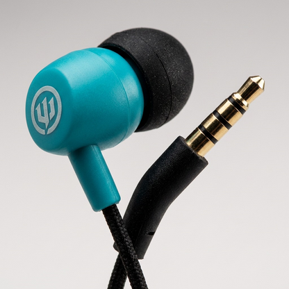 A detailed macro photo showing the texture of the teal earbud and gold-plated jack from the Wicked Audio Brawl earbuds.
