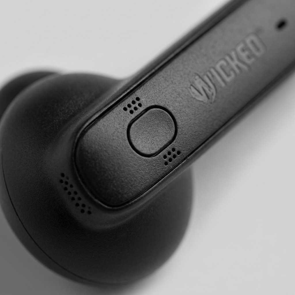 Macro photo detail of the black Wicked Audio Mojo 800 true wireless earbud stem and microphone.