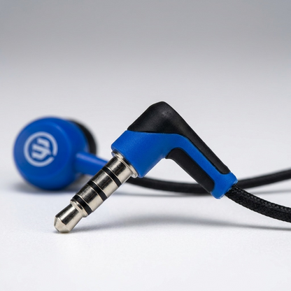 Macro close-up of blue Wicked Audio Brawl earbuds: precise 45-degree angle stereo jack, textured cable.