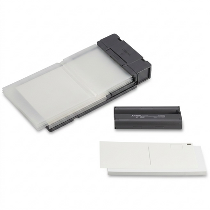 A high-resolution, pure white background studio photograph of the Canon KP-36IP ink and paper set.